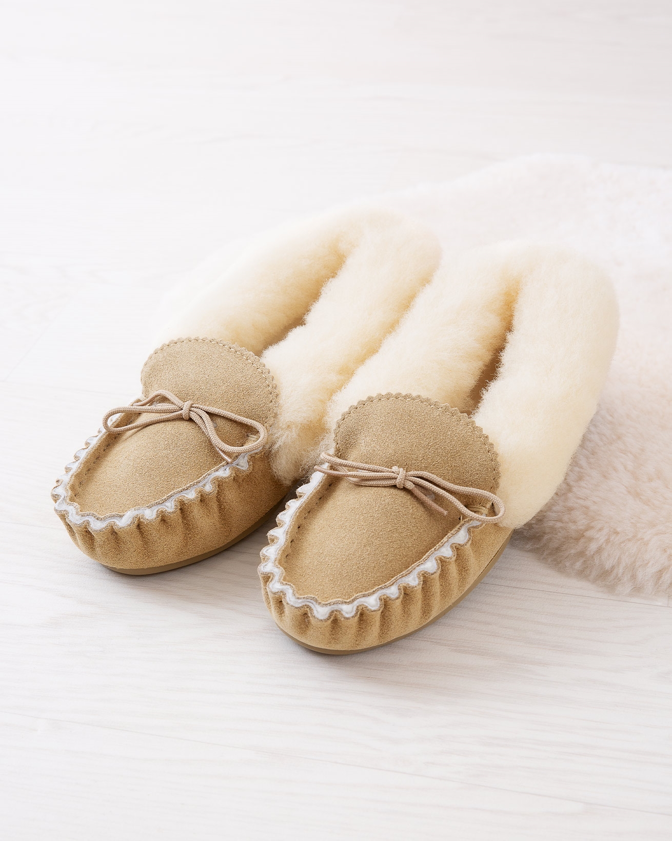 ladies moccasin slippers hard sole